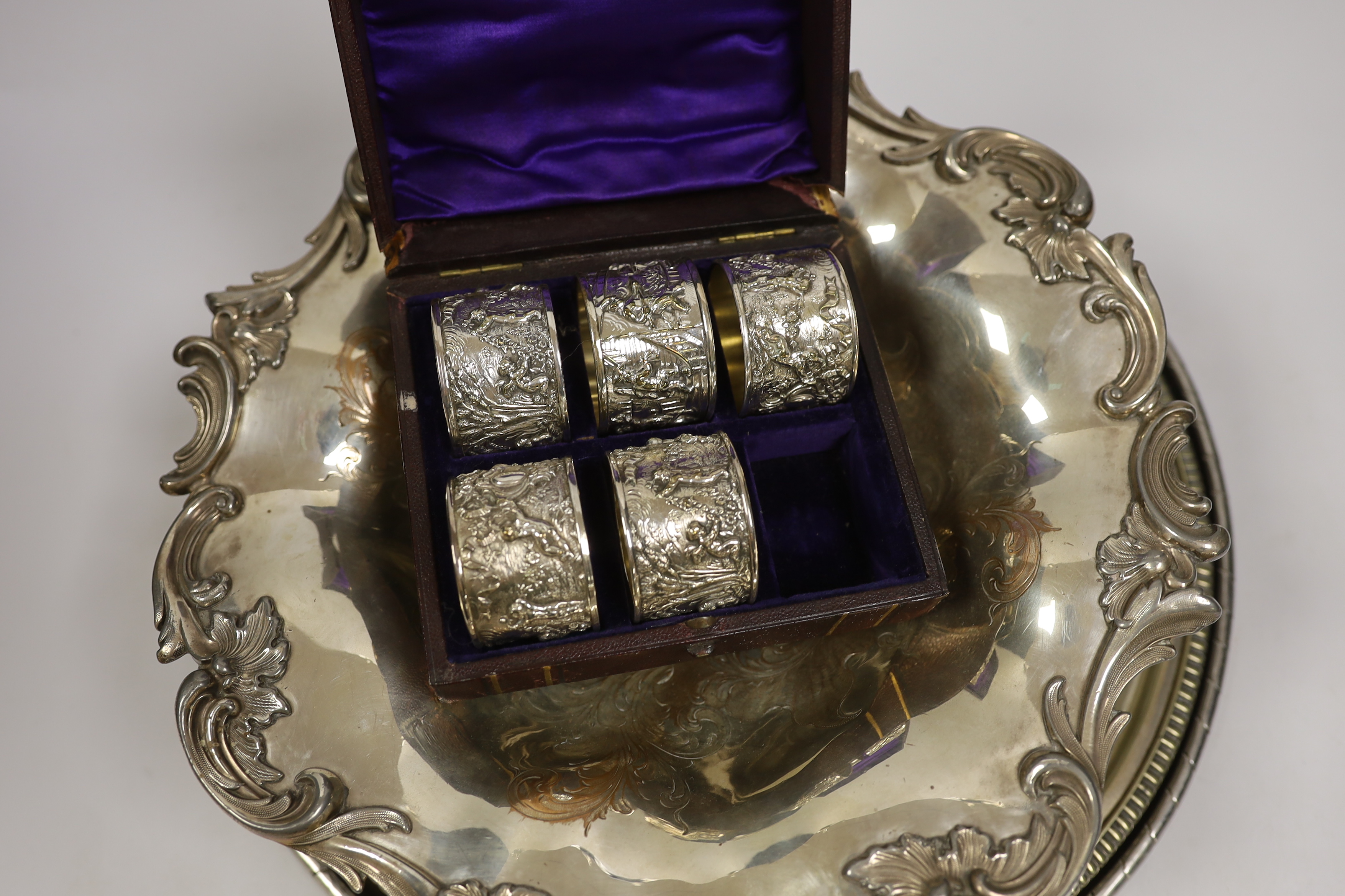An Old Sheffield plate bowl, five napkin rings, and two salvers, largest 38cm diameter